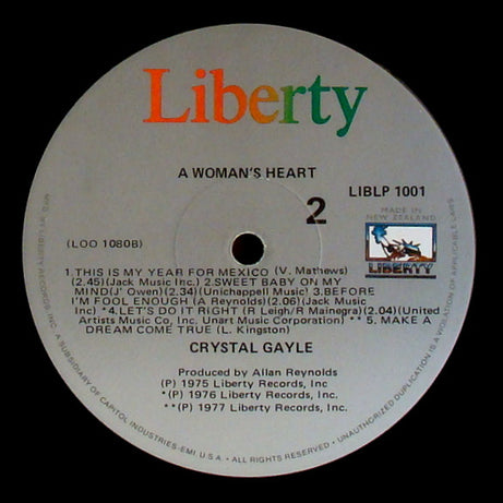 Crystal Gayle : A Woman's Heart (LP, Comp)