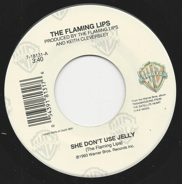 The Flaming Lips : She Don't Use Jelly / Turn It On (7")