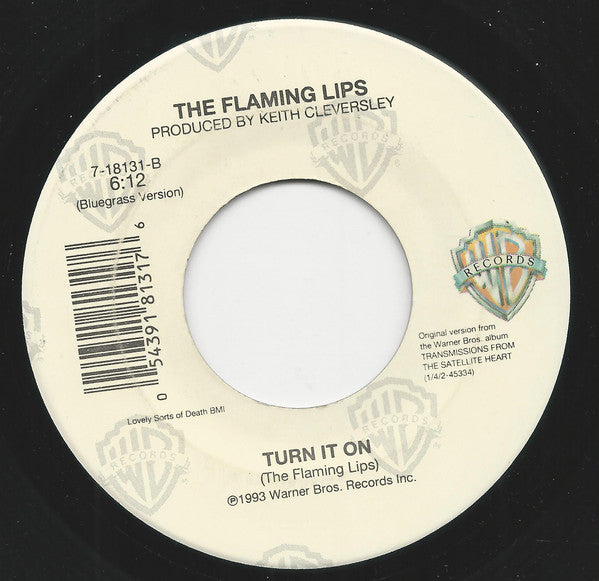 The Flaming Lips : She Don't Use Jelly / Turn It On (7")