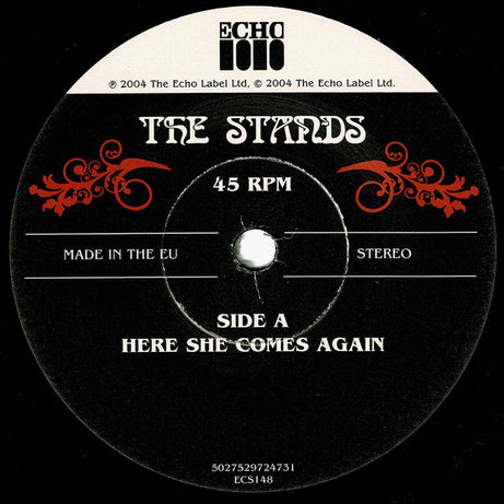 The Stands : Here She Comes Again (7", Single, Ltd, Num)