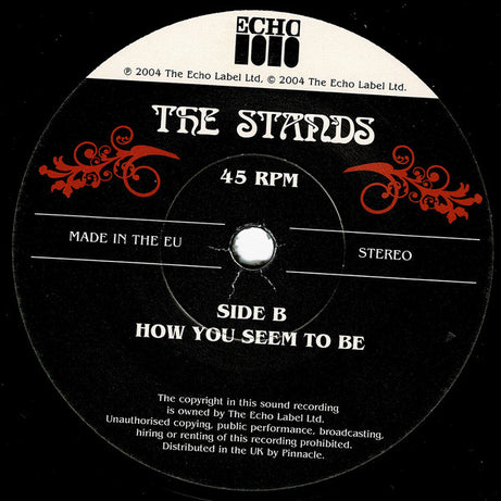 The Stands : Here She Comes Again (7", Single, Ltd, Num)