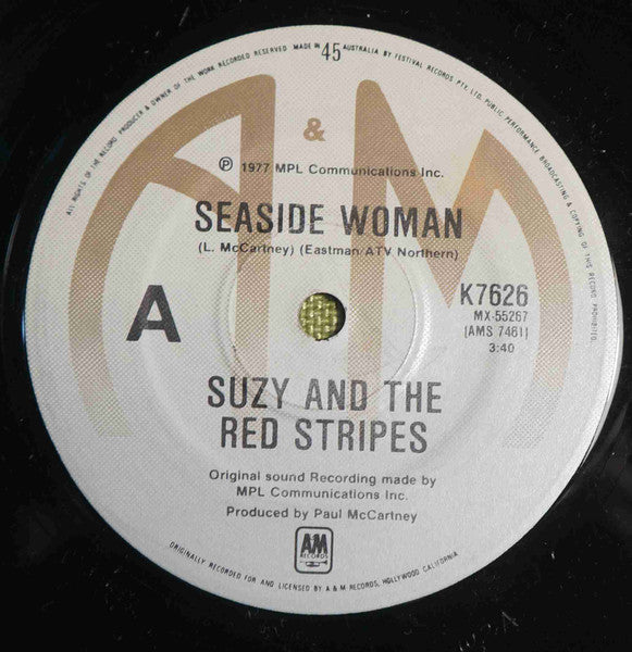 Suzy And The Red Stripes : Seaside Woman (7", Single)