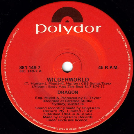 Dragon (5) : Wilderworld (7", Single)
