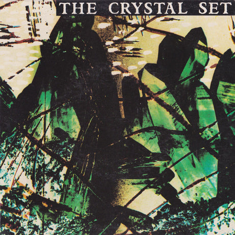 The Crystal Set : A Drop In The Ocean / She Counts Up The Days (7", Single, RE)