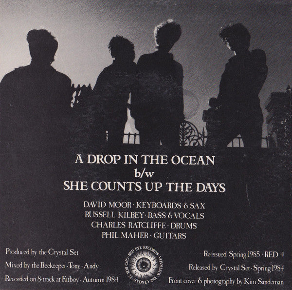 The Crystal Set : A Drop In The Ocean / She Counts Up The Days (7", Single, RE)