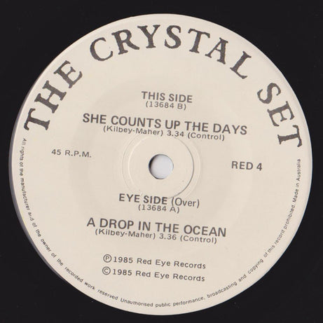 The Crystal Set : A Drop In The Ocean / She Counts Up The Days (7", Single, RE)