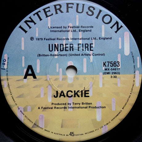 Jackie (7) : Under Fire (7", Single)