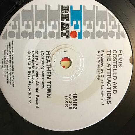 Elvis Costello And The Attractions* : Everyday I Write The Book (7", Single)